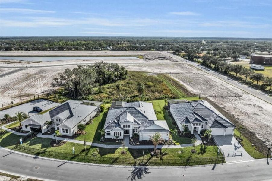 Aerial view of the River Preserve Estates community in Parrish, FL, showing layout and nearby surroundings (Image 11). Aerial view of the River Preserve Estates community in Parrish, FL, showing layout and nearby surroundings (Image 11).