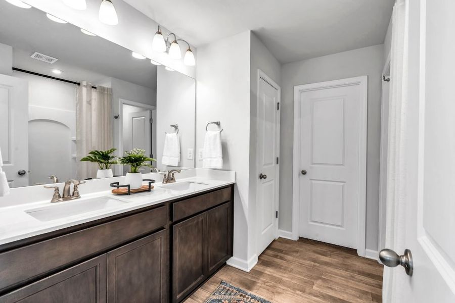 Furnished interior in a model home at The Reserve at Chapel Hill Phase II in Douglasville (Image 26).