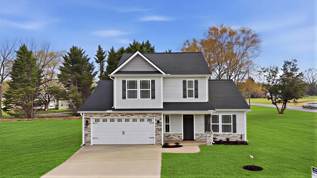 Front exterior of a home in the Ballentine Ridge community, located in Lyman, SC (Image 4).