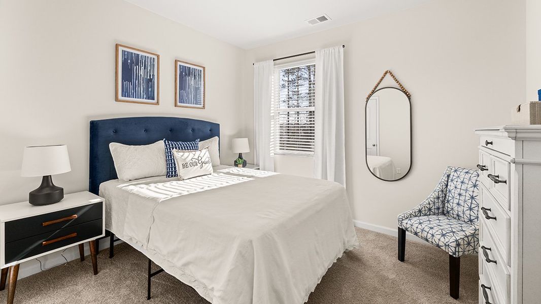 Furnished interior in a model home at Thompson Ridge in Dallas (Image 32).