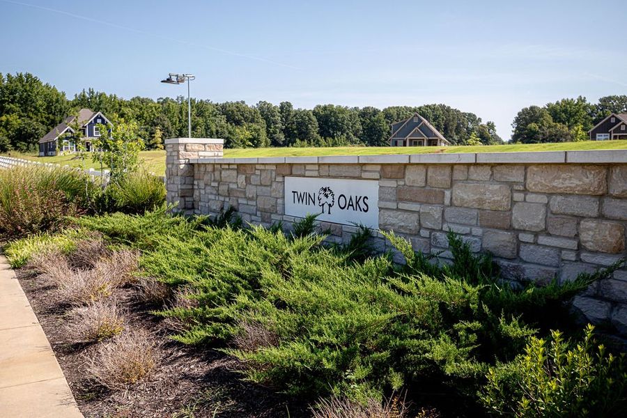 Entrance to the Twin Oaks community in Oakland, TN, featuring signage and landscaping (Image 13). Entrance to the Twin Oaks community in Oakland, TN, featuring signage and landscaping (Image 13).