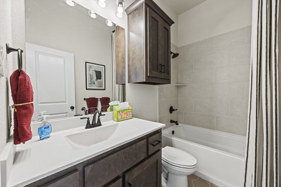 Furnished interior in a model home at El Dorado in Granbury (Image 21).