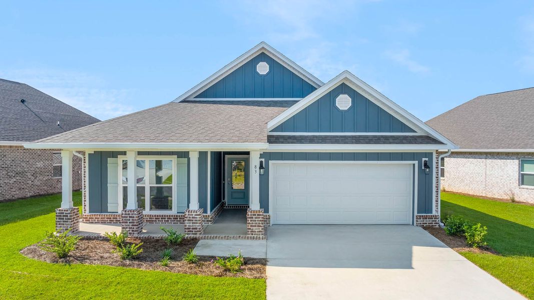 Front exterior of a home in the Owl's Head Farms community, located in Freeport, FL (Image 3).