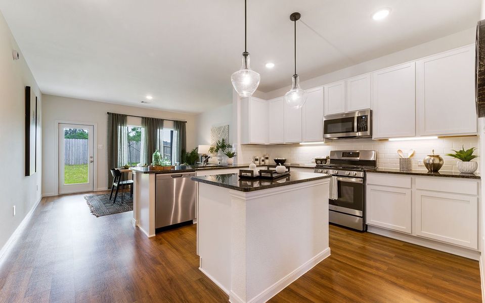 Furnished interior in a model home at The Pines at Seven Coves in Willis (Image 20).