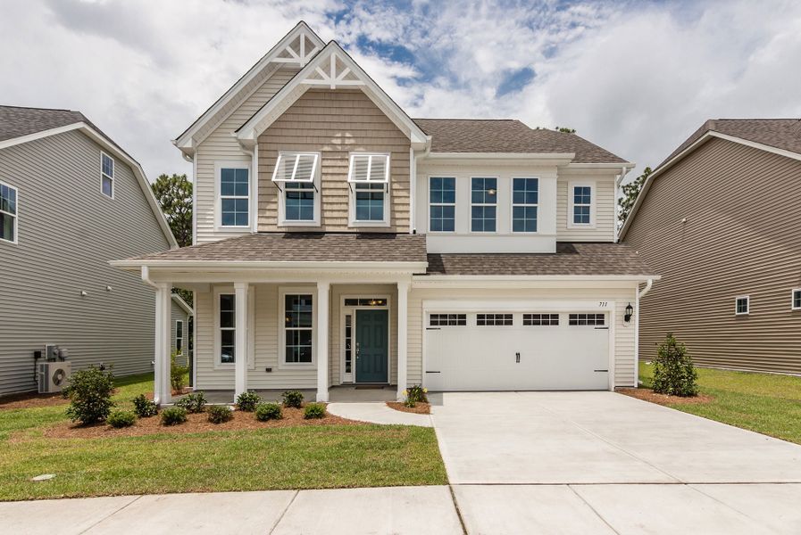 Front exterior of a home in the Melton Oaks - Robuck Homes community, located in Garner, NC (Image 9). Front exterior of a home in the Melton Oaks - Robuck Homes community, located in Garner, NC (Image 9).