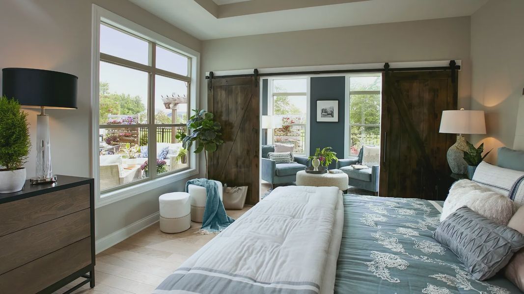 Furnished interior in a model home at The Courtyards of Franklin Goldmine in Cumming (Image 10).