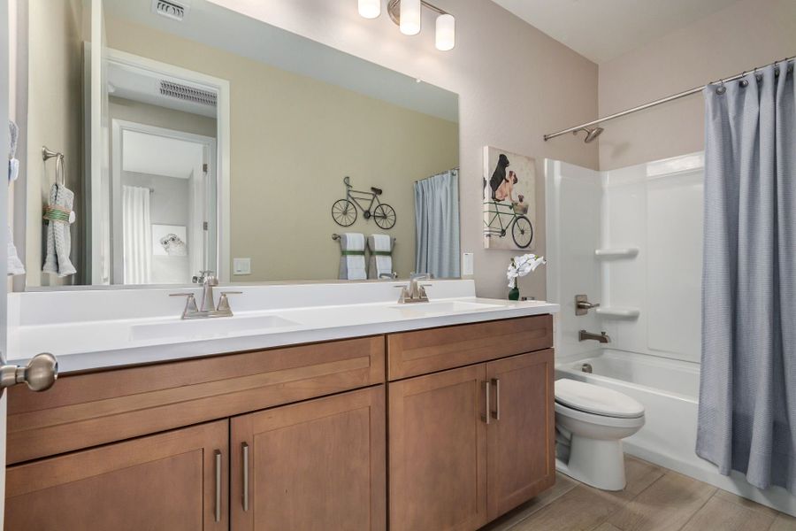 Furnished interior in a model home at Agave Springs at Teravalis in Buckeye (Image 41).