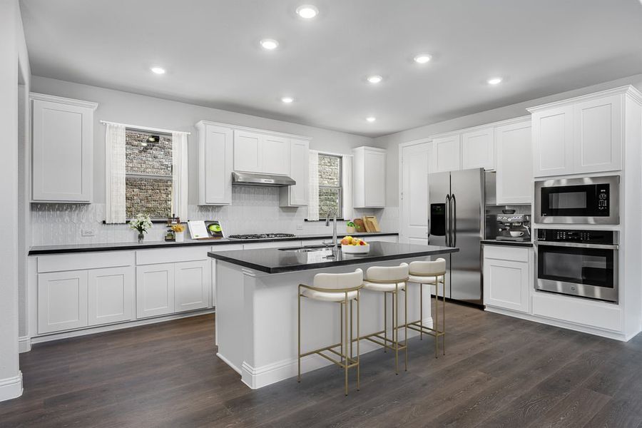 Furnished interior in a model home at The Ranch at Uptown Celina 40s in Celina (Image 21).