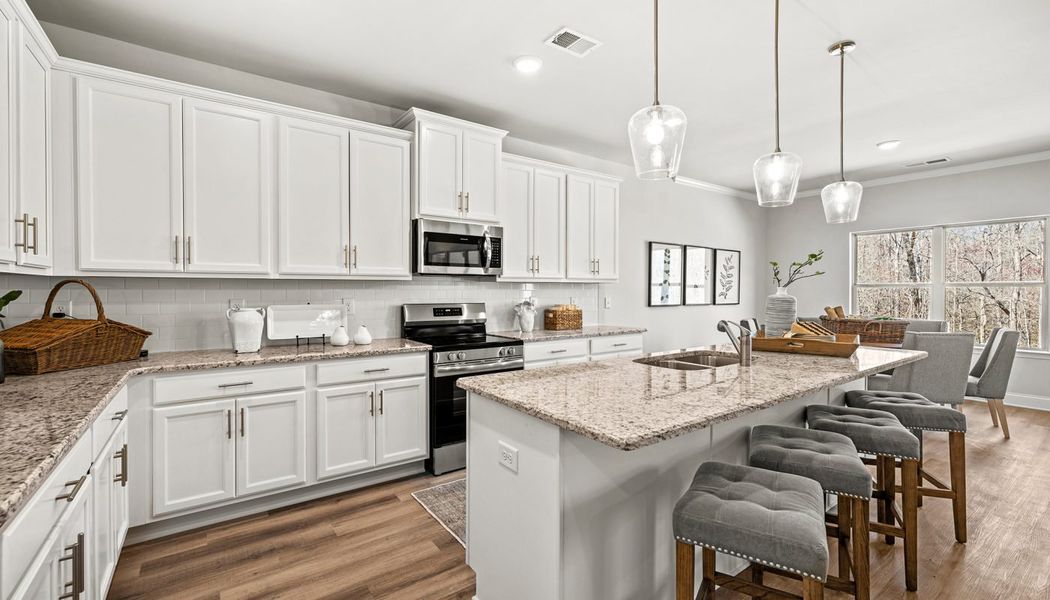 Furnished interior in a model home at Chimney Oaks in Homer (Image 11). Furnished interior in a model home at Chimney Oaks in Homer (Image 11).