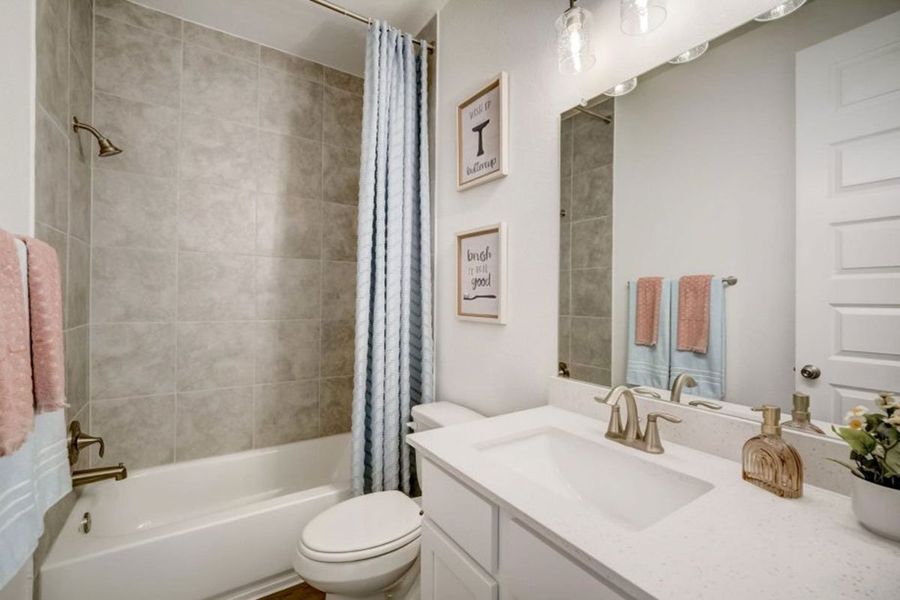 Furnished interior in a model home at Avery Centre in Round Rock (Image 46).