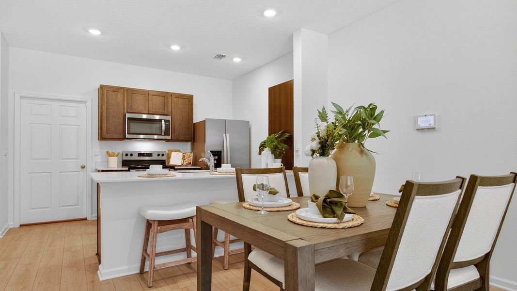 Furnished interior in a model home at Liberty Cove in Yulee (Image 13).