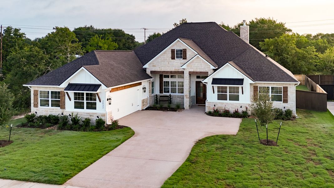 Front exterior of a home in the Pebble Creek community, located in College Station, TX (Image 10). Front exterior of a home in the Pebble Creek community, located in College Station, TX (Image 10).