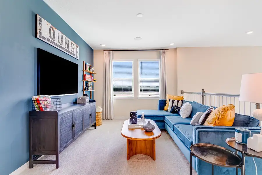 Furnished interior in a model home at Lochside in Mount Dora (Image 5).