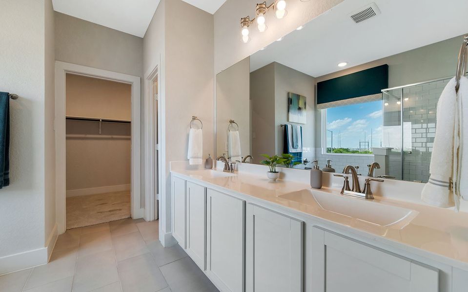 Furnished interior in a model home at Hunter's Ranch in San Antonio (Image 28).