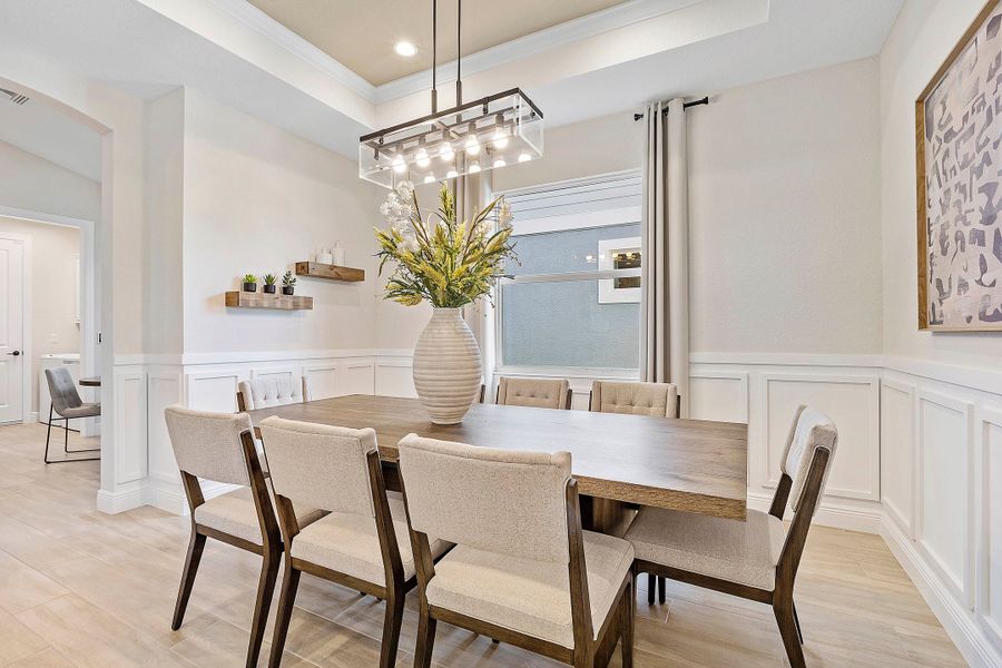 Furnished interior in a model home at The Sanctuary – Resort Collection in Punta Gorda (Image 29).