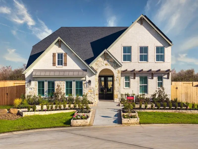 Front exterior of a home in the Ellwood: Heritage Collection community, located in Iowa Colony, TX (Image 3).