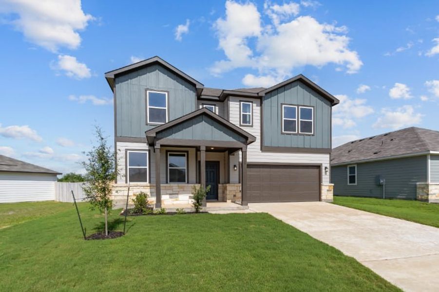 A house with a green lawn. A house with a green lawn.