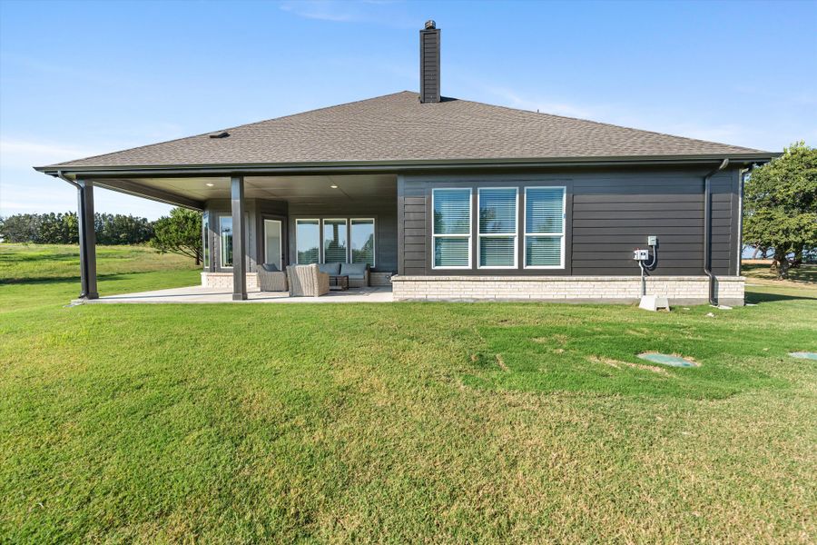 Front exterior of a home in the Oak Grove Addition community, located in Springtown, TX (Image 15).