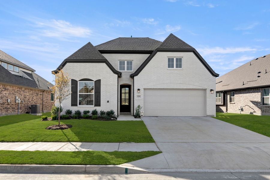 Front exterior of a home in the West Crossing community, located in Anna, TX (Image 5).