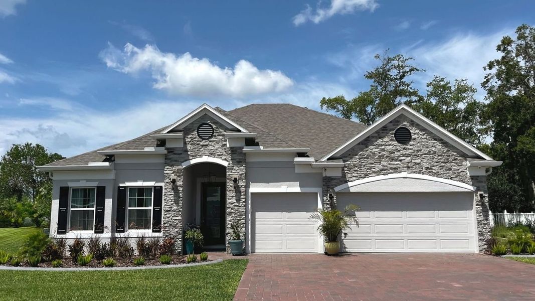 Front exterior of a home in the Hontoon Reserve community, located in Deland, FL (Image 4).
