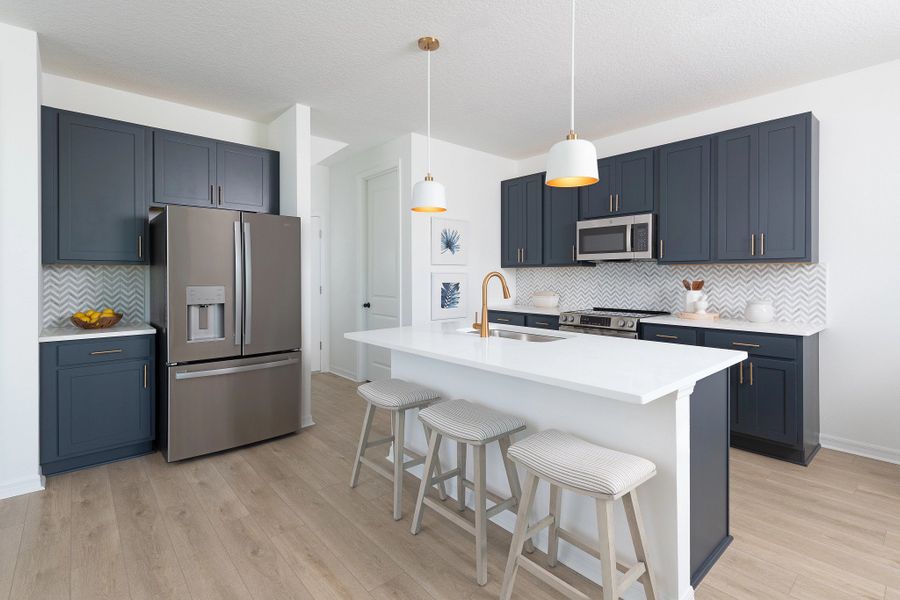 Furnished interior in a model home at Catamaran Cove Townhomes in Rockledge (Image 3).