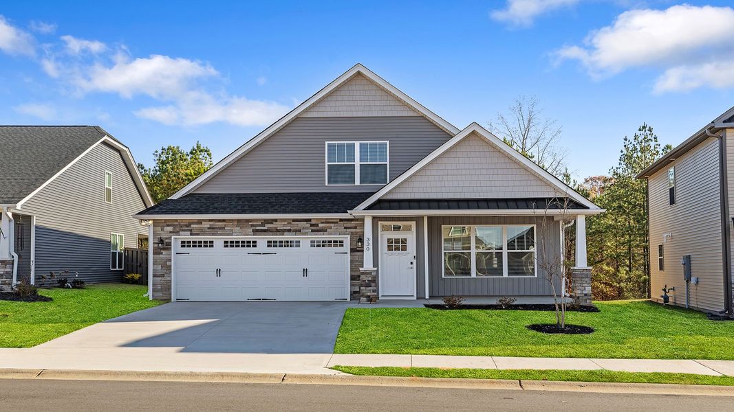 Front exterior of a home in the River Trace community, located in Simpsonville, SC (Image 1).