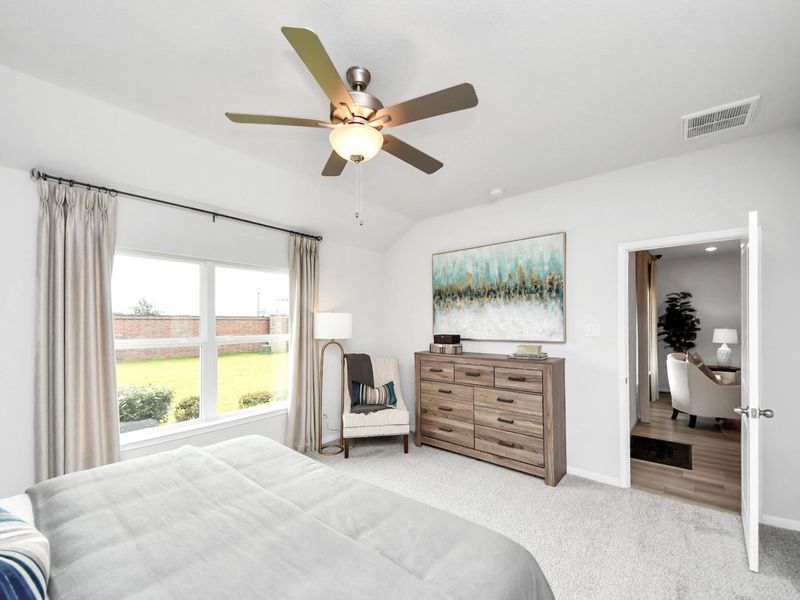 Furnished interior in a model home at Sunterra in Katy (Image 23).
