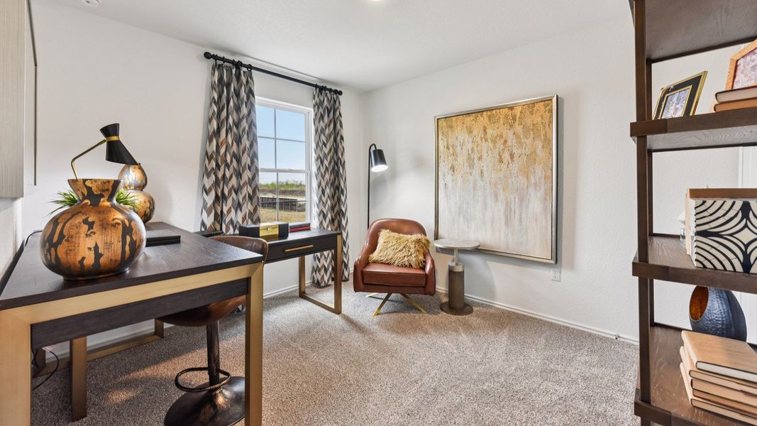 Furnished interior in a model home at Palomino in Manor (Image 39).