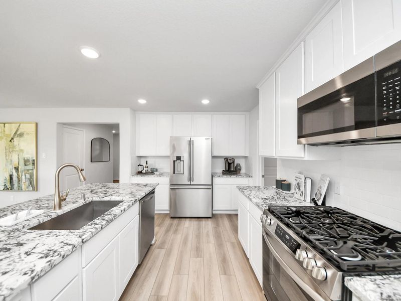 Furnished interior in a model home at Sunterra in Katy (Image 12).