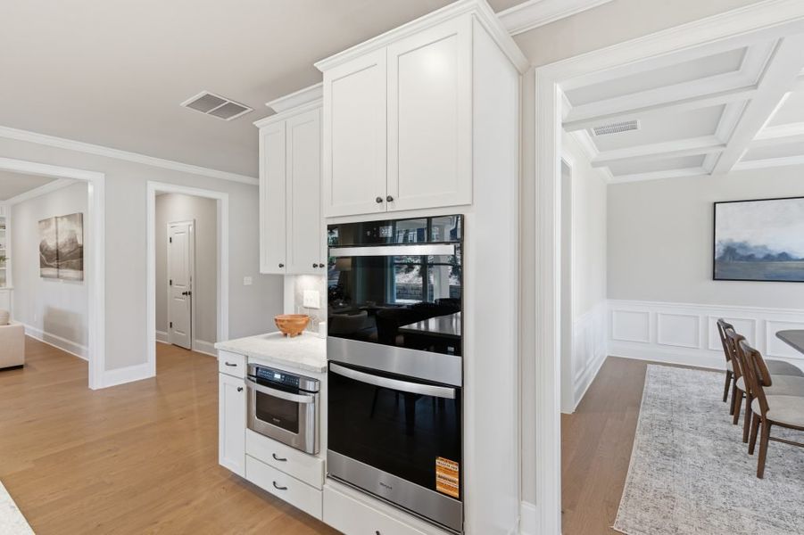 Furnished interior in a model home at Ford Landing in Acworth (Image 19).