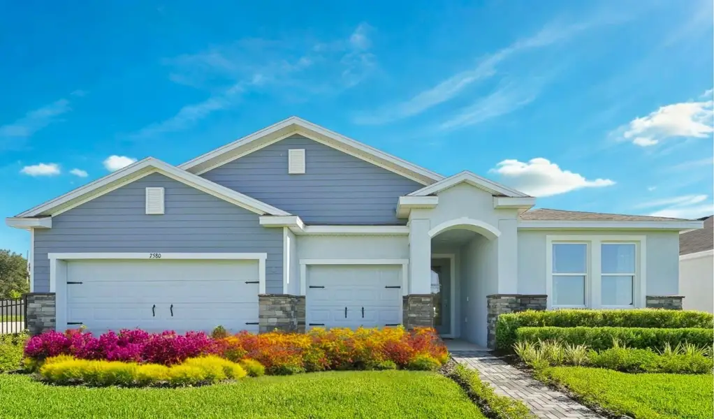Front exterior of a home in the Farm at Varrea community, located in Plant City, FL (Image 5).