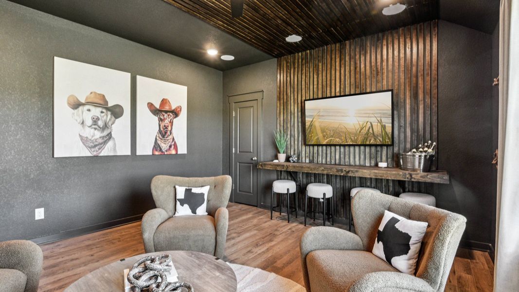 Game Room Area located behind the kitchen, featuring an additional closet and a ceiling fan Game Room Area located behind the kitchen, featuring an additional closet and a ceiling fan