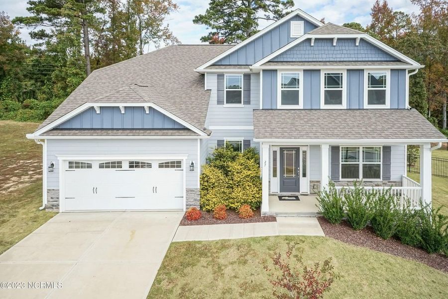 Front exterior of a home in the Mill Creek Cove community, located in Bolivia, NC (Image 9).