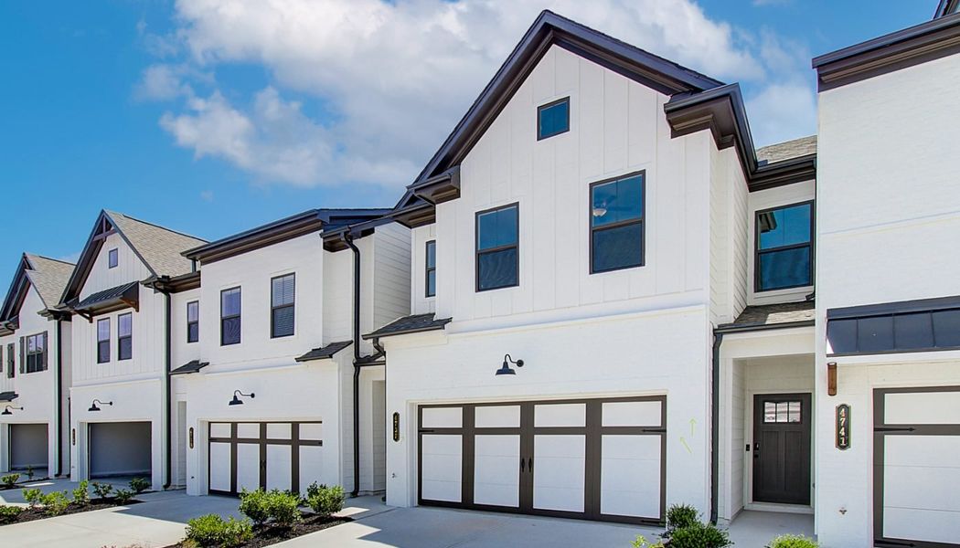 Front exterior of a home in the The Towns at Auburn Station East community, located in Auburn, GA (Image 4).