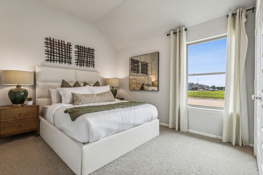 Bedroom in a Stonehaven new Turquoise home in Seagoville TX by Trophy Signature Homes – REPRESENTATIVE PHOTO