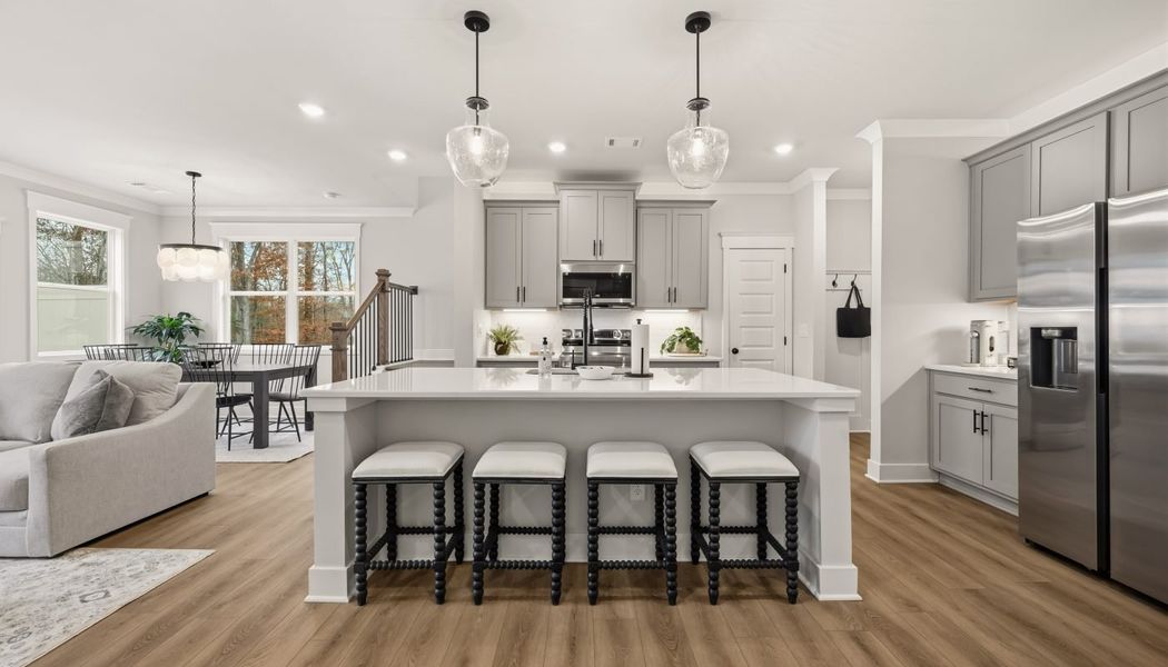 Furnished interior in a model home at Millstone at Mundy Mill in Gainesville (Image 14).