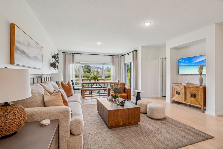 Furnished interior in a model home at Thompson Village Townhomes in Apopka (Image 4).