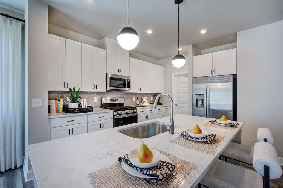 A kitchen island for both prep space and a place to gather A kitchen island for both prep space and a place to gather
