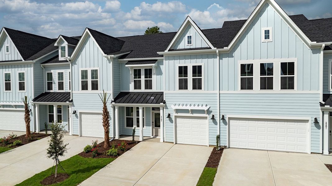 Front exterior of a home in the Grand Park community, located in Leland, NC (Image 29).