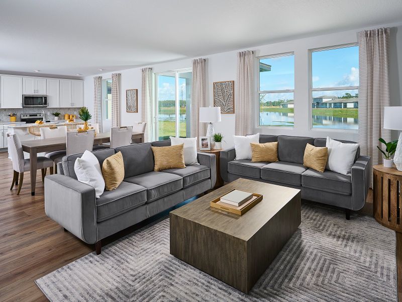 Family room in the Primrose plan modeled at The Meadow at Crossprairie