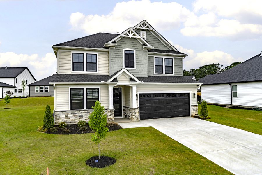 Front exterior of a home in the The Meadows at Midway community, located in Anderson, SC (Image 12). Front exterior of a home in the The Meadows at Midway community, located in Anderson, SC (Image 12).