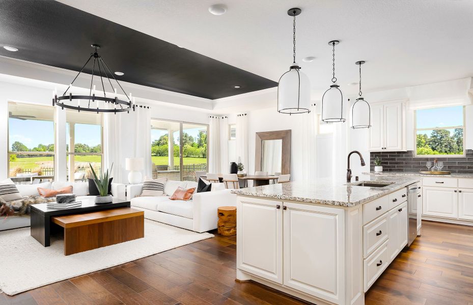 Open kitchen and gathering area in Palmary floor plan at Del Webb Fulshear active adult community