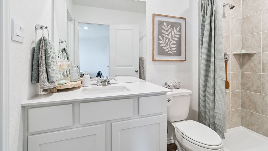 Furnished interior in a model home at Blue Ridge Ranch in San Antonio (Image 21).