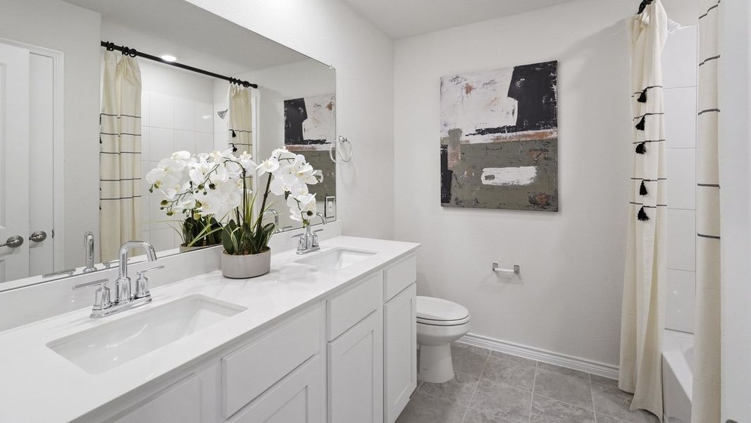 Furnished interior in a model home at The Woods at Lindsey Place in Anna (Image 43).