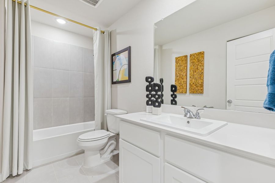 Bathroom in the Hayden home plan by Trophy Signature Homes - REPRESENTATIVE PHOTO