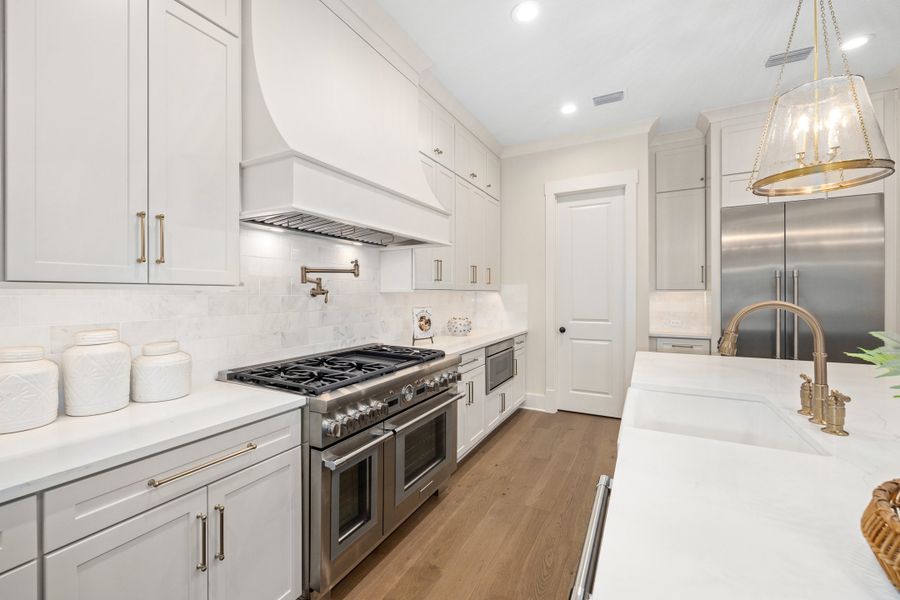 Furnished interior in a model home at Hidden Creek at SilverLeaf 80' Gold Series in St. Augustine (Image 56).