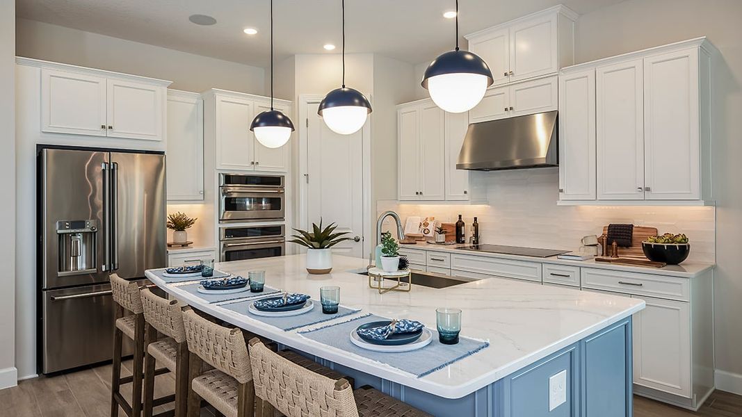 Furnished interior in a model home at Esplanade Lake Club in Fort Myers (Image 8). Furnished interior in a model home at Esplanade Lake Club in Fort Myers (Image 8).