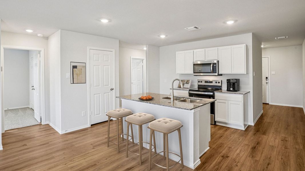 Furnished interior in a model home at The Villages at Schwertner Ranch in Jarrell (Image 6).