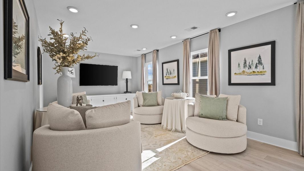 Furnished interior in a model home at Ansley Trails in Douglasville (Image 9).