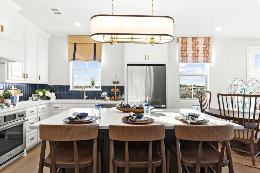 Furnished interior in a model home at The Tribute in The Colony (Image 8).